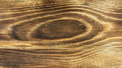 The texture of the burnt board