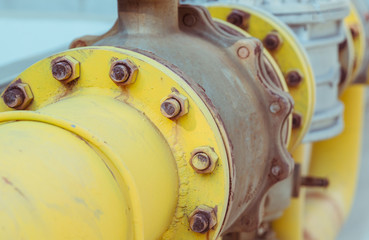 a yellow water/gas pipe in a factory.