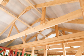 Unfinished frame house. Building process