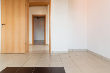 Interior of modern house, nobody inside, There are two doors open.