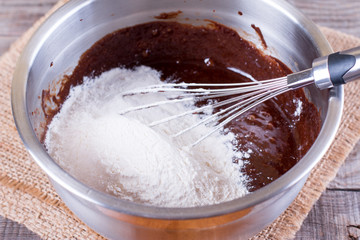 Mixed flour and chocolate dough for baking cake