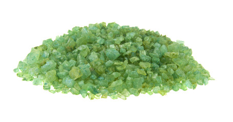 green sea salt isolated on white background