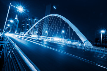 bridge road landscape at night,blue toned,China.