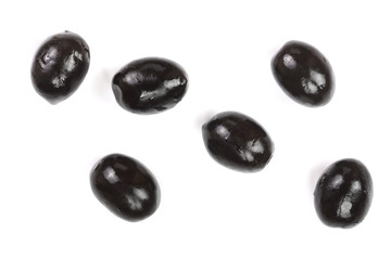 whole black olives isolated on white background. Top view. Flat lay pattern