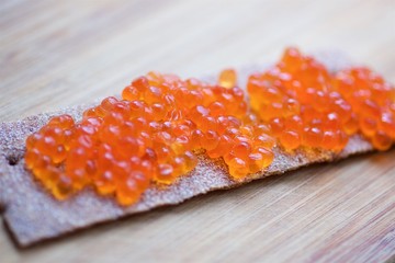 sandwich of bread and red caviar