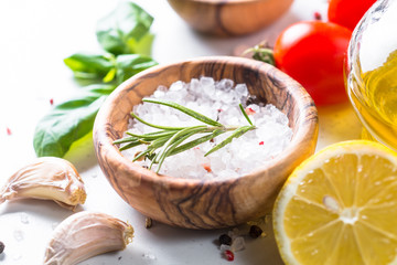 Sea salt, rosemary, basil, olive oil, tomatoes.