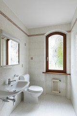 Retro bathroom in light tiles