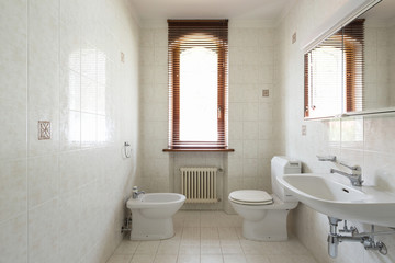 Naklejka na ściany i meble Retro bathroom in light tiles