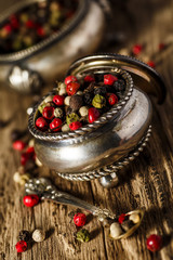 bunch fresh raw red hot chilli pepper and bell pepper on a wooden background