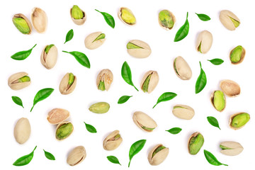 Pistachios isolated on white background, top view. Flat lay pattern