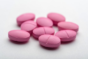 Obraz na płótnie Canvas Pharmacy theme. Multicolored Isolated Pills and Capsules.