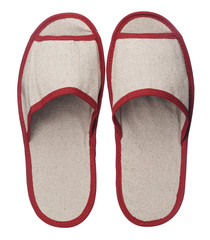 Red hotel slippers isolated on white background. Close up, high resolution