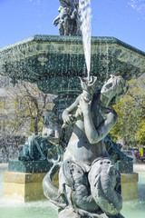 Fototapeta na wymiar Baroque style fountain in Rossio Square Lisbon