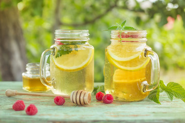 Refreshing cold drink with lemon and mint