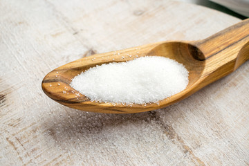 Artificial Sweeteners and Sugar Substitutes in wooden spoon. Natural and synthetic sugarfree food...
