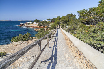 Coastal route, maritime promenade, town of Sant Antoni, Ibiza Island,Spain.