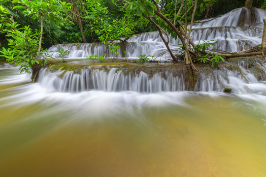 Noppiboon waterfall in Tropical Rain Forest at Sangkhlaburi , Kanchanaburi Province, Thailand © rbk365