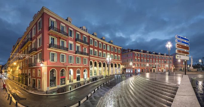 Place Massena square with red buildings at dusk in Nice, France (static image with animated sky)

