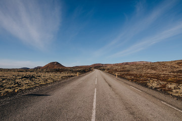 Fototapeta na wymiar empty asphalt road in majestic icelandic landscape at sunny day, reykjanes, iceland