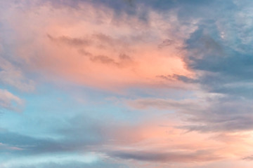 Naklejka na ściany i meble Sunset sky with multicolor clouds.