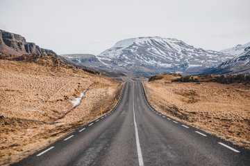 empty asphalt road and beautiful landscape in iceland, hvalfjardarvegur