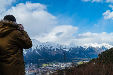 Fototapeta na wymiar Fotograf über Innsbruck