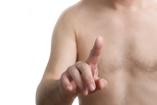 naked man presses the screen with his finger