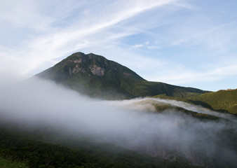 Fog rolls over Mt. Rausu late in the day