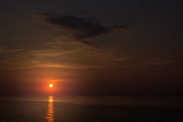 Fototapeta premium Morning sky with the sun over the sea at sunrise, Black Sea, Romania