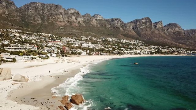 Camp's Bay beach with Table Mountain and Twelve Apostles