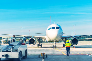 Naklejka premium Airplane parking at the airport