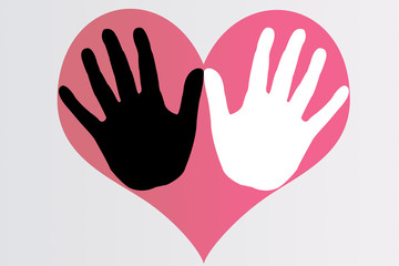 Obraz premium Manos negras y blancas con corazón rojo.