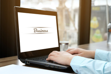 Woman used computer laptop on wooden table bar, example text on screen, business technology concept, mock up on screen laptop, clip paths at screen