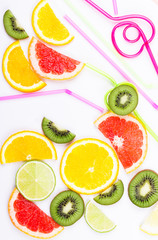 Fototapeta premium Citrus and colorful straws for coctail