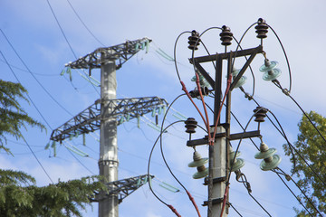 The old archaic electricity power line and the new one on backside