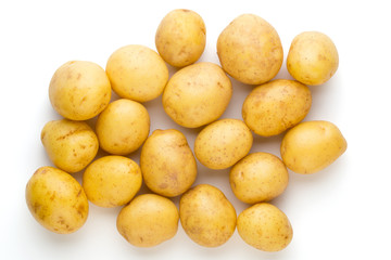 New potato and rosemarin isolated on white background close up.