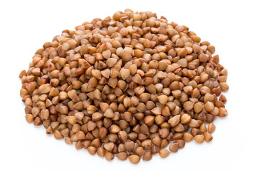 Buckwheat grains isolated on the white background.