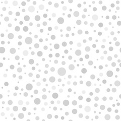 Seamless background with random light round elements. Abstract ornament. Dotted abstract pattern