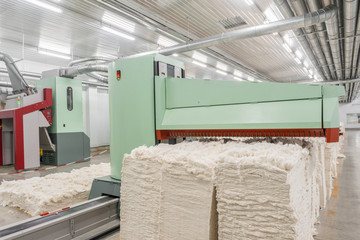 carding machine in spinning workshop. equipment and technologies at the textile factory
