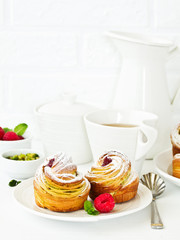 puff pastry with pistachios and raspberries.