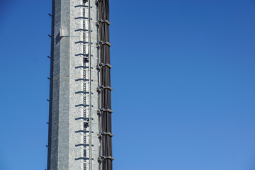 stairs to the comunications pole with wires and cable