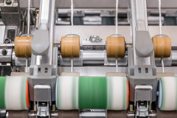 Machinery and equipment in the workshop for the production of thread, general view. interior of industrial textile factory