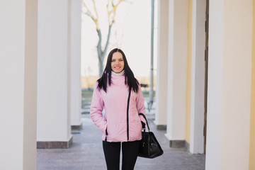 Obraz premium A woman is walking in the park