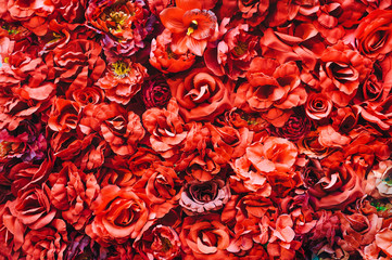 Background of red flowers. Roses. Peonies. Close up. Decor.
