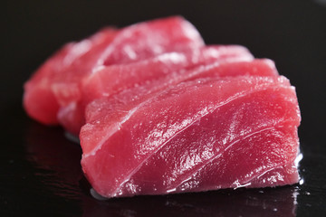 Macro shot of sushi, sashimi, uramaki and nighiri. typical Japanese dish consisting of rice, salmon or tuna,shrimp and fish eggs soaked in soy. Concept: Japanese restaurant, sushi, 