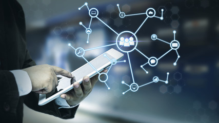 Close up Businessman using his Mobile Phone or tablet outdoor , isolated on white background