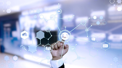 Businessman using computer laptop with social network communications. Touch future, Interface technology.