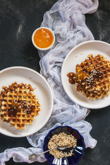 Bright and cozy Breakfast. Toast with butter and jam, pate. Family, happiness, joy, Easter holiday. top view. Close up. Vertical. Selective focus.