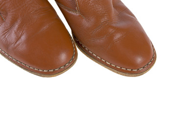 female shoes in orange heeled used on a white background