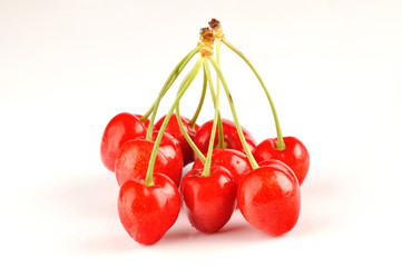 Bunch of fresh cherries. Group of fresh cherries isolated on the white background.